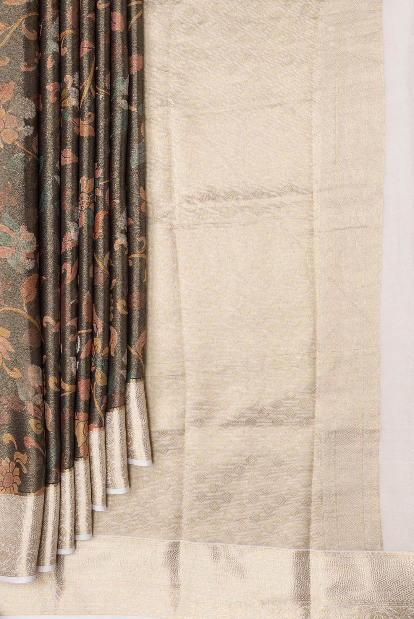 Pleats and pallu of Brown Dual Tone Mysore Silk Saree with Zari Brocade on the body and Zari Border. 