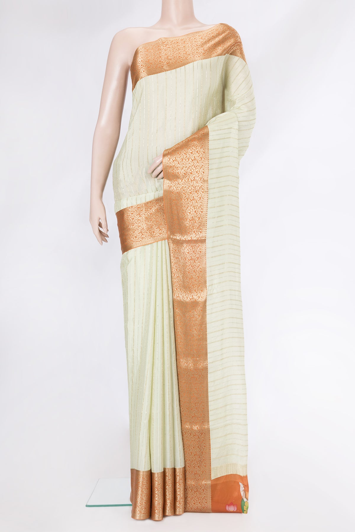 Off White Mysore Crepe Saree with Stripes on the body and Zari Border.  displayed on a mannequin