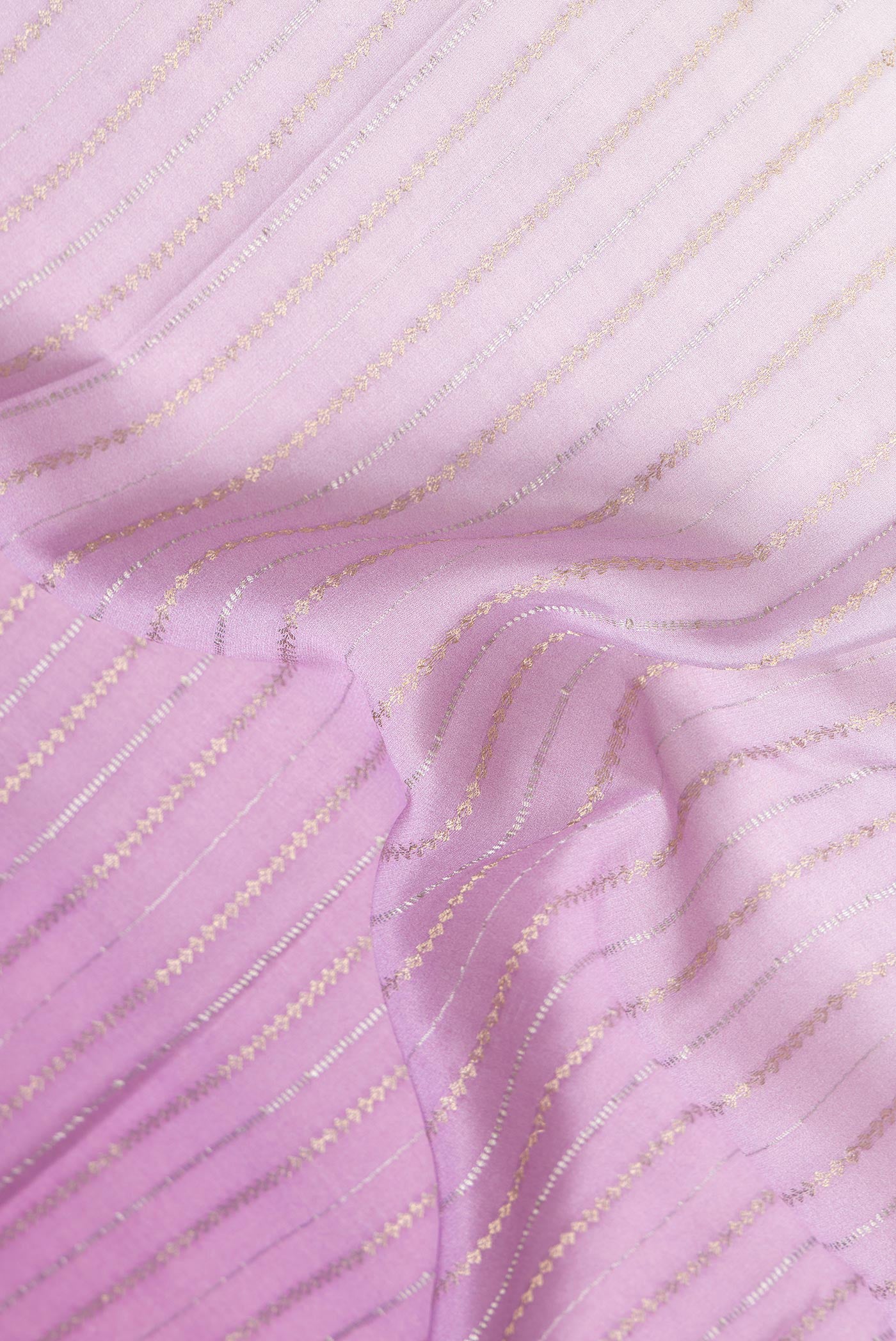 Close up of Lavender Dual Tone Mysore Silk Saree with Stripes on the body and Zari Border.  displaying folds