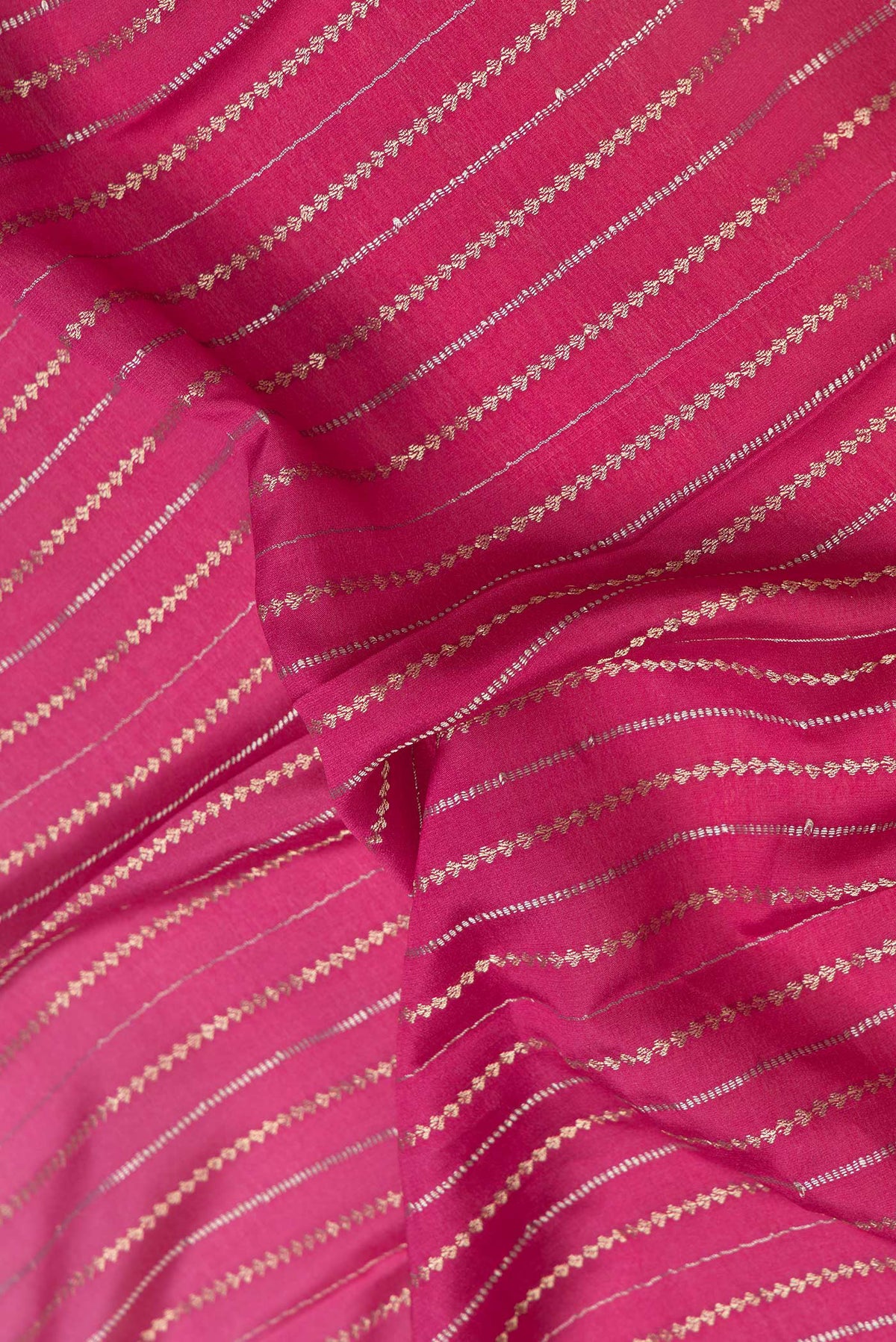 Close up of Pink Dual Tone Mysore Silk Saree with Stripes on the body and Zari Border.  displaying folds