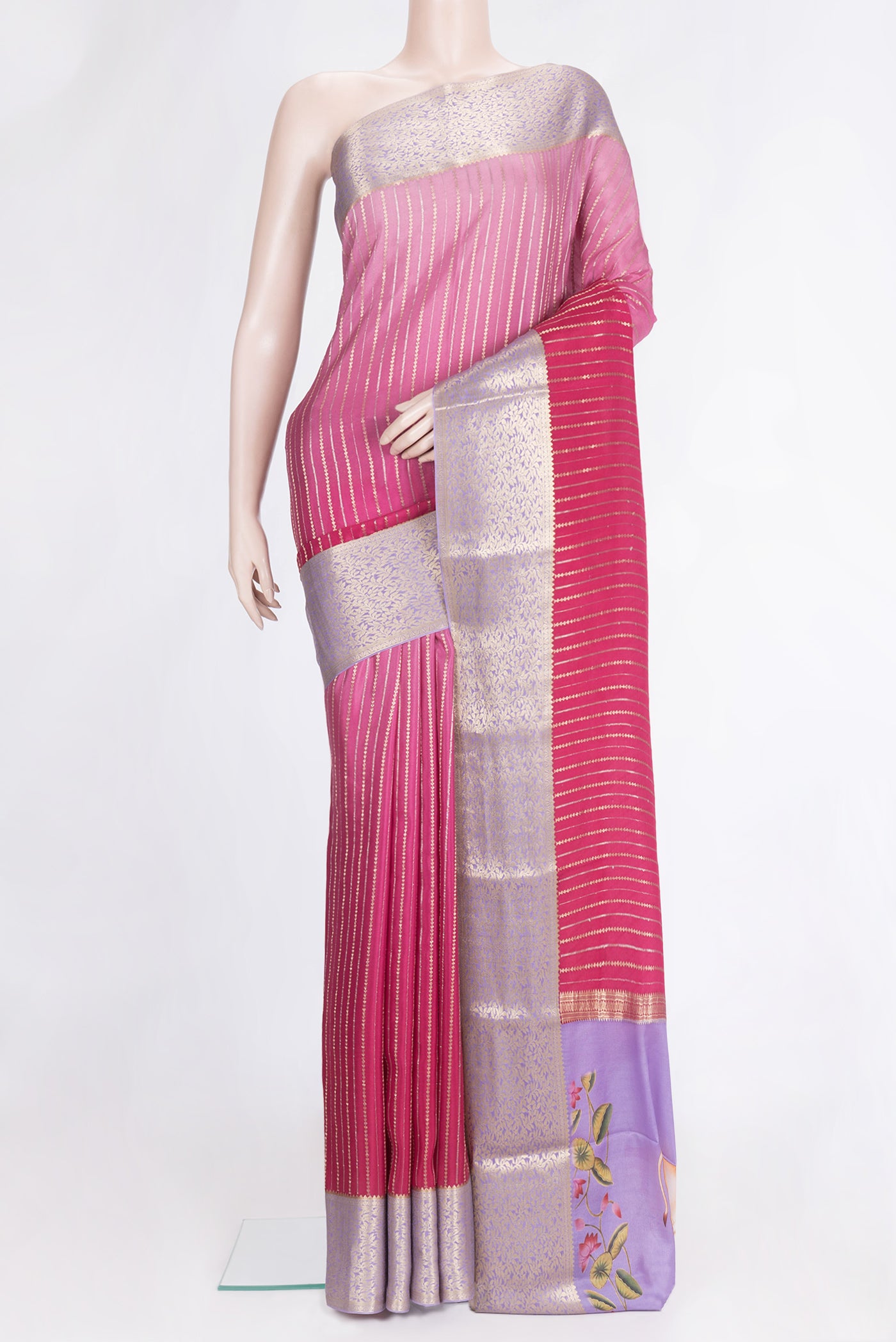 Pink Dual Tone Mysore Silk Saree with Stripes on the body and Zari Border.  displayed on a mannequin