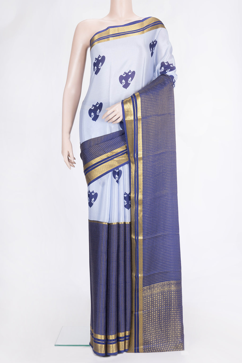 Grey and Navy Blue Color Mysore Silk Saree with Half And Half on the body and Zari Border.  displayed on a mannequin