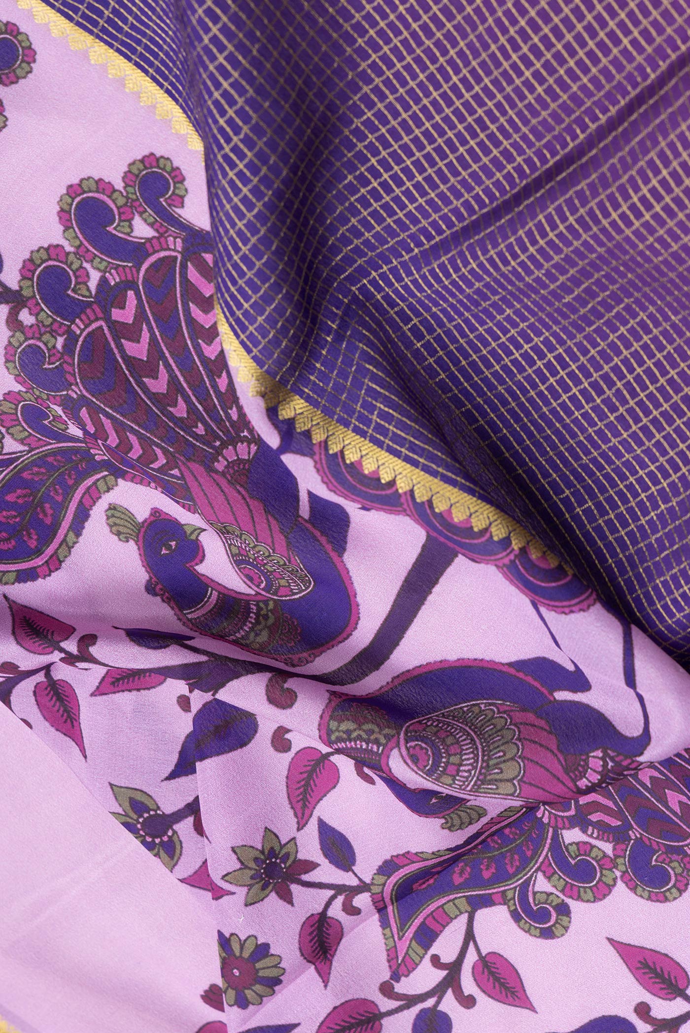 Close up of Purple and Pink Color Mysore Silk Saree with Half And Half on the body and Zari Border.  displaying folds