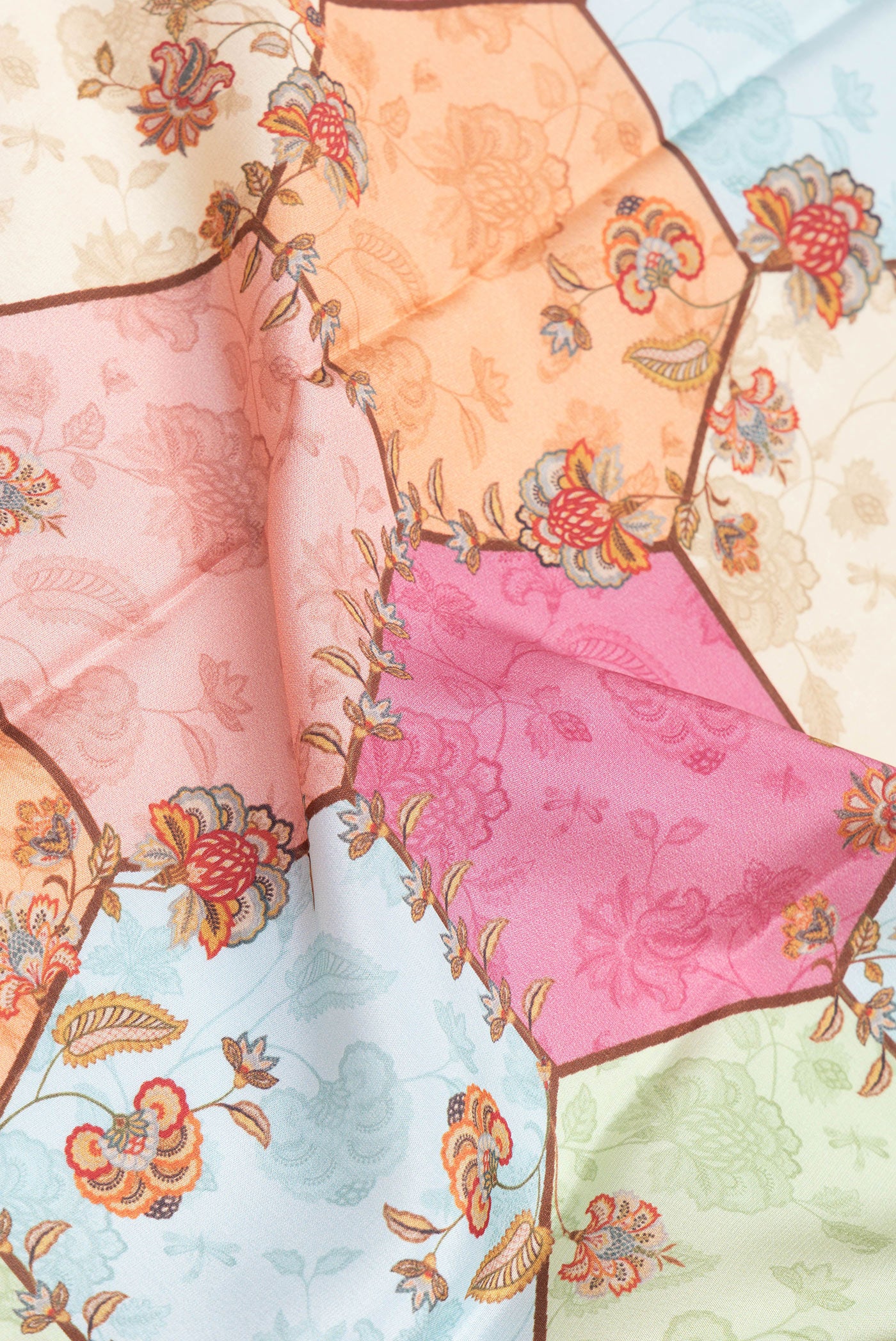 Close up of Multi Color Mysore Silk Saree with Printed design on the body and Zari Border.  displaying folds