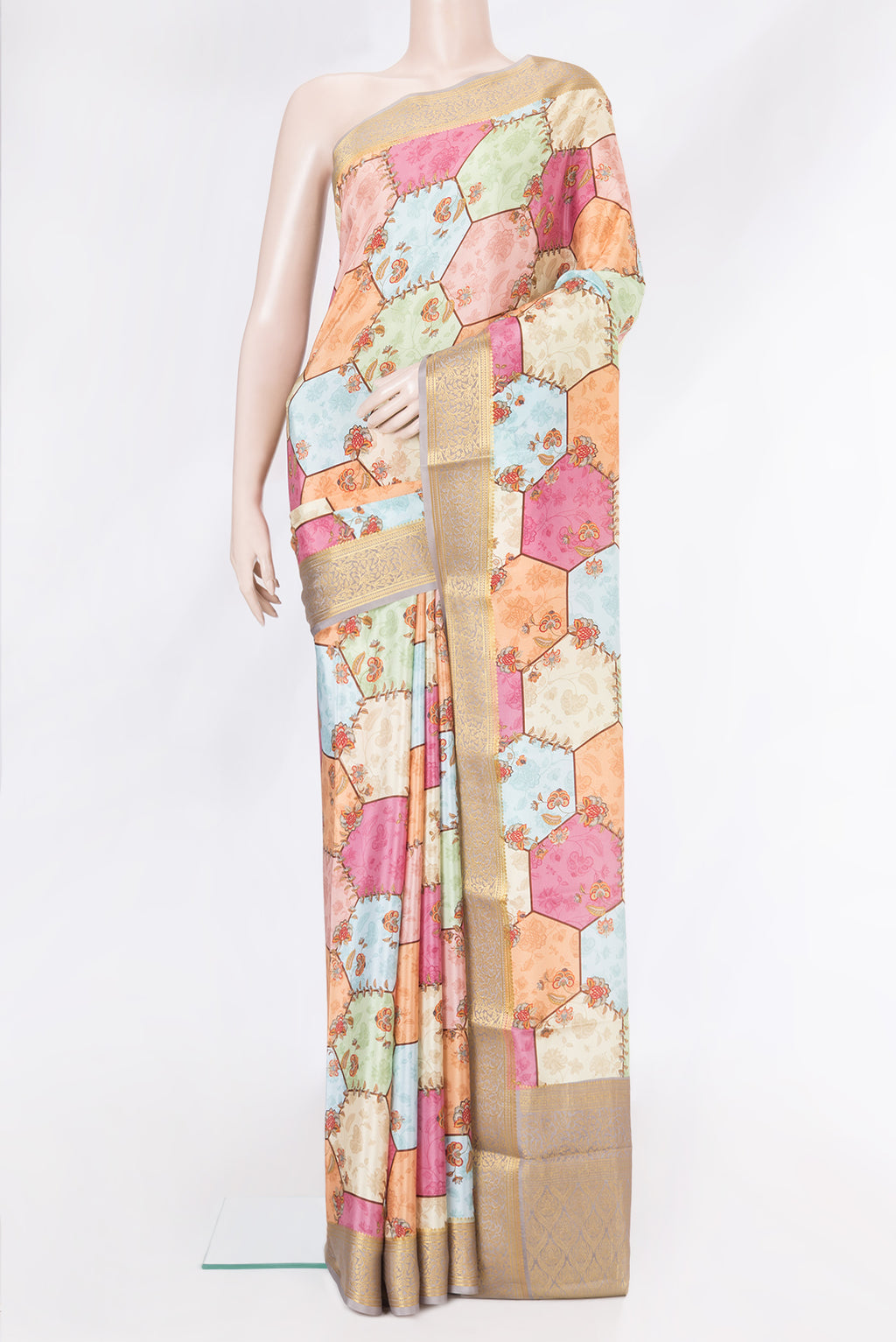 Multi Color Mysore Silk Saree with Printed design on the body and Zari Border.  displayed on a mannequin