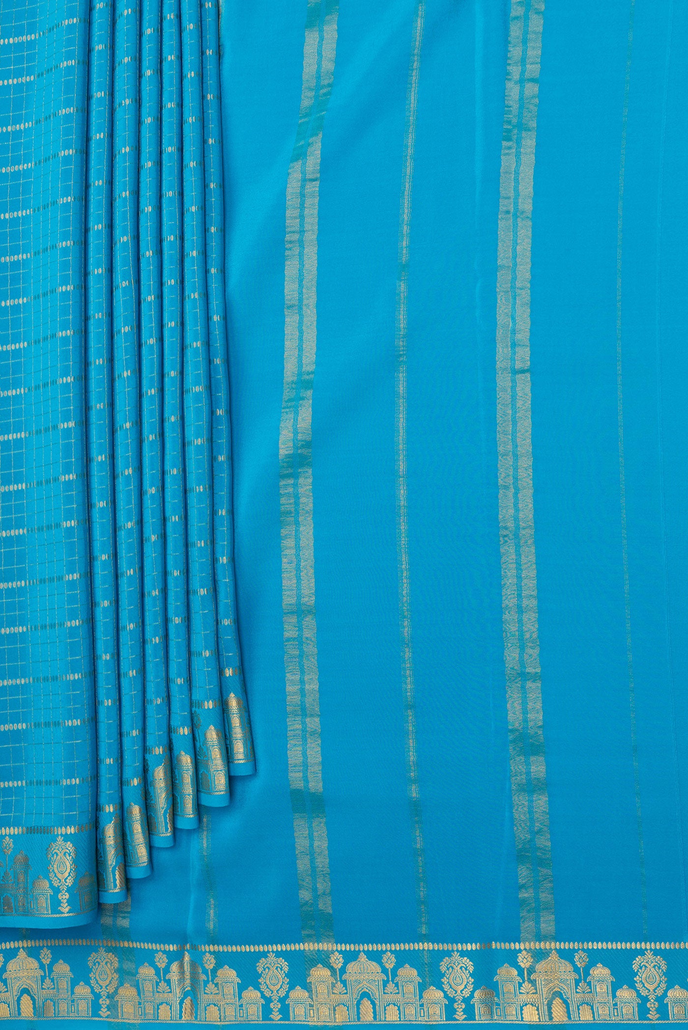Pleats and pallu of Sky Blue Mysore Silk Saree with Checked design on the body and Zari Border. 