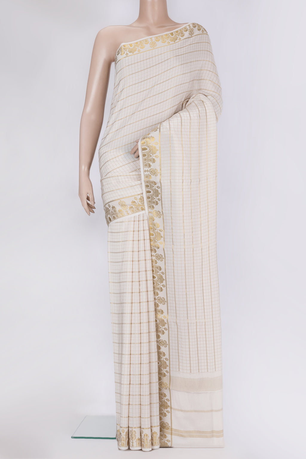 Off White Mysore Silk Saree with Checked design on the body and Zari Border.  displayed on a mannequin