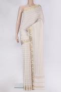 Off White Mysore Silk Saree with Checked design on the body and Zari Border.  displayed on a mannequin