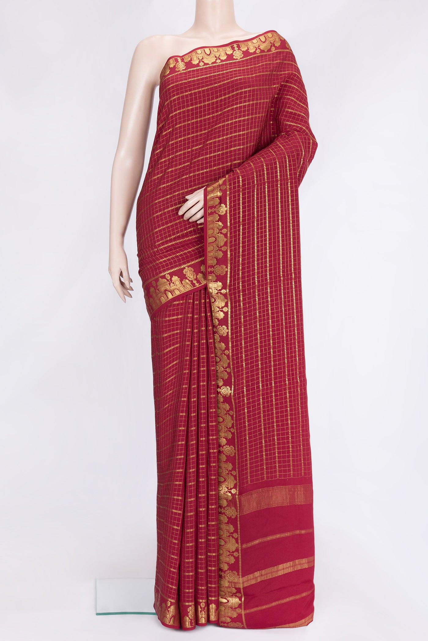 Maroon Dual Tone Mysore Silk Saree with Checked design on the body and Fancy Border.  displayed on a mannequin