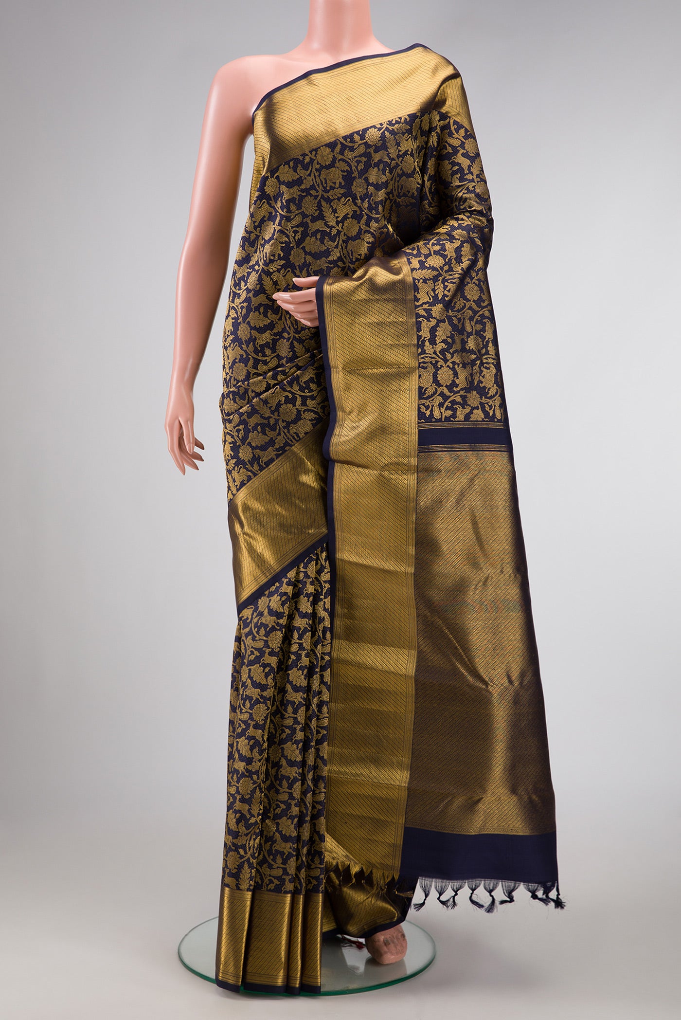 Violet Dual Tone Kanchipuram Silk Saree with Zari Brocade on the body and Zari Border.  displayed on a mannequin