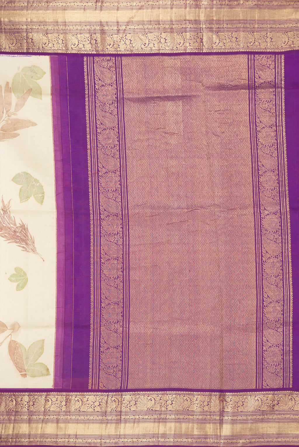 Close up image of the pallu of Beige Dual Tone Kanchipuram Silk Saree with Printed design on the body and Zari Border. 
