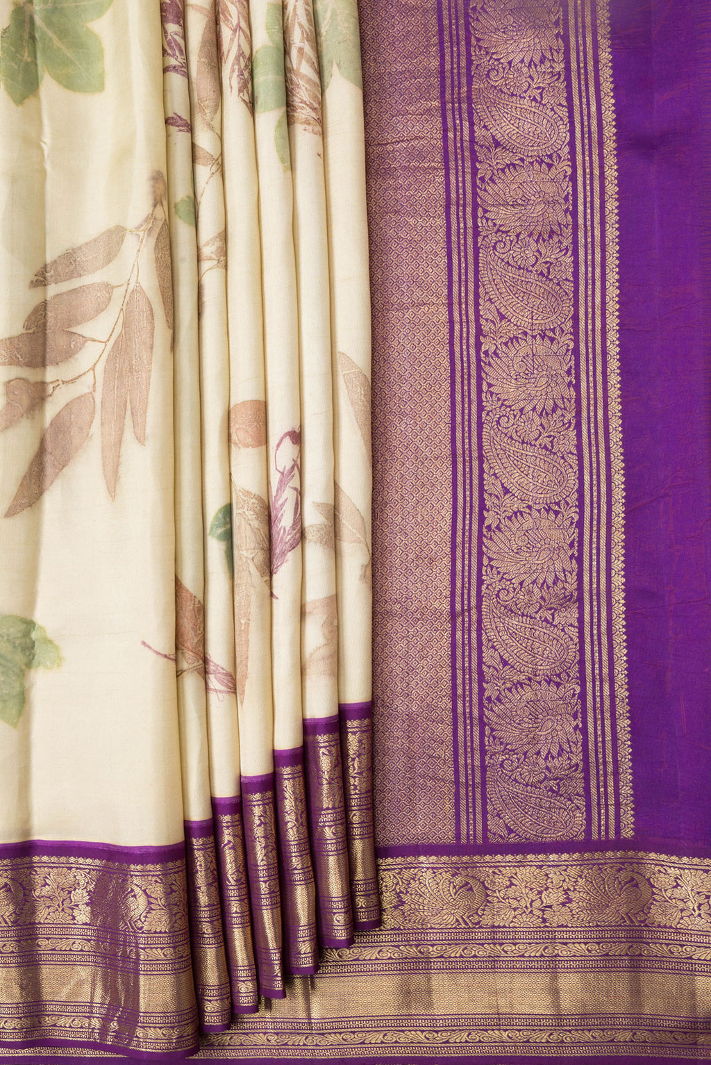 Pleats and pallu of Beige Dual Tone Kanchipuram Silk Saree with Printed design on the body and Zari Border. 