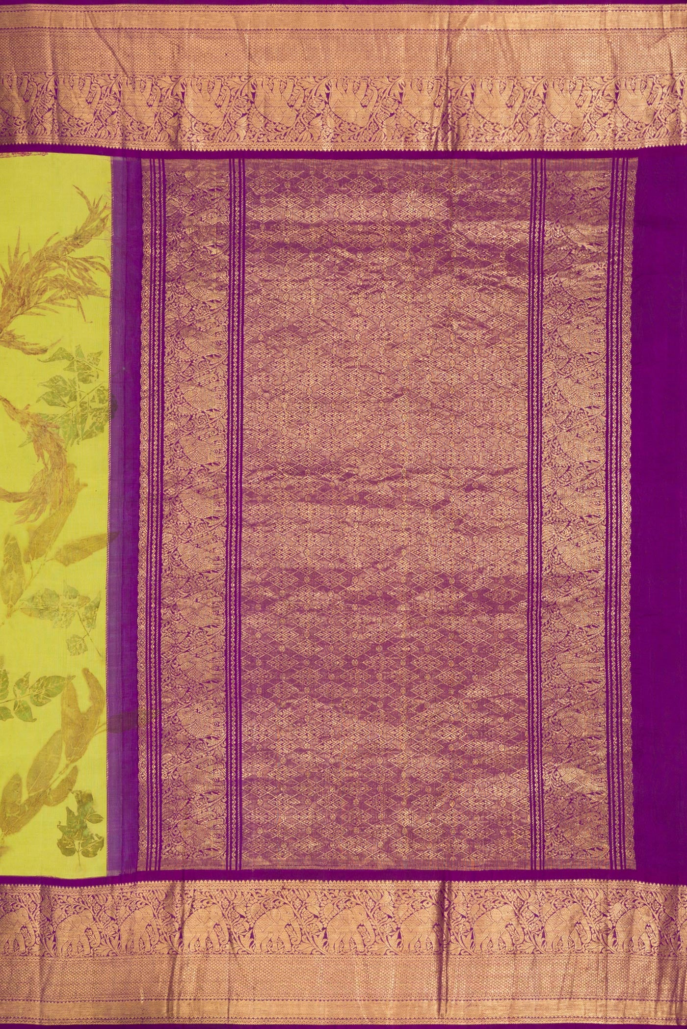 Close up image of the pallu of Parrot Green Dual Tone Kanchipuram Silk Saree with Printed design on the body and Zari Border. 