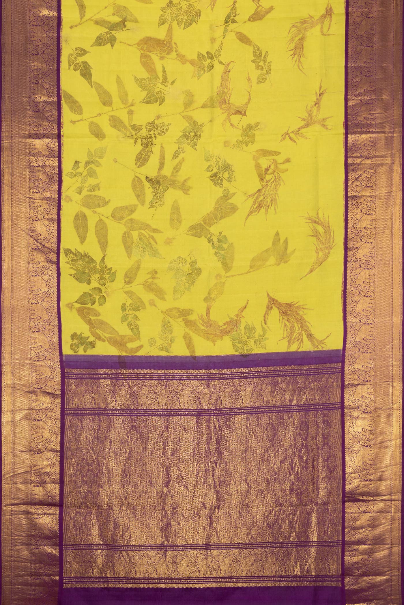 Flat view of Parrot Green Dual Tone Kanchipuram Silk Saree with Printed design on the body and Zari Border. 