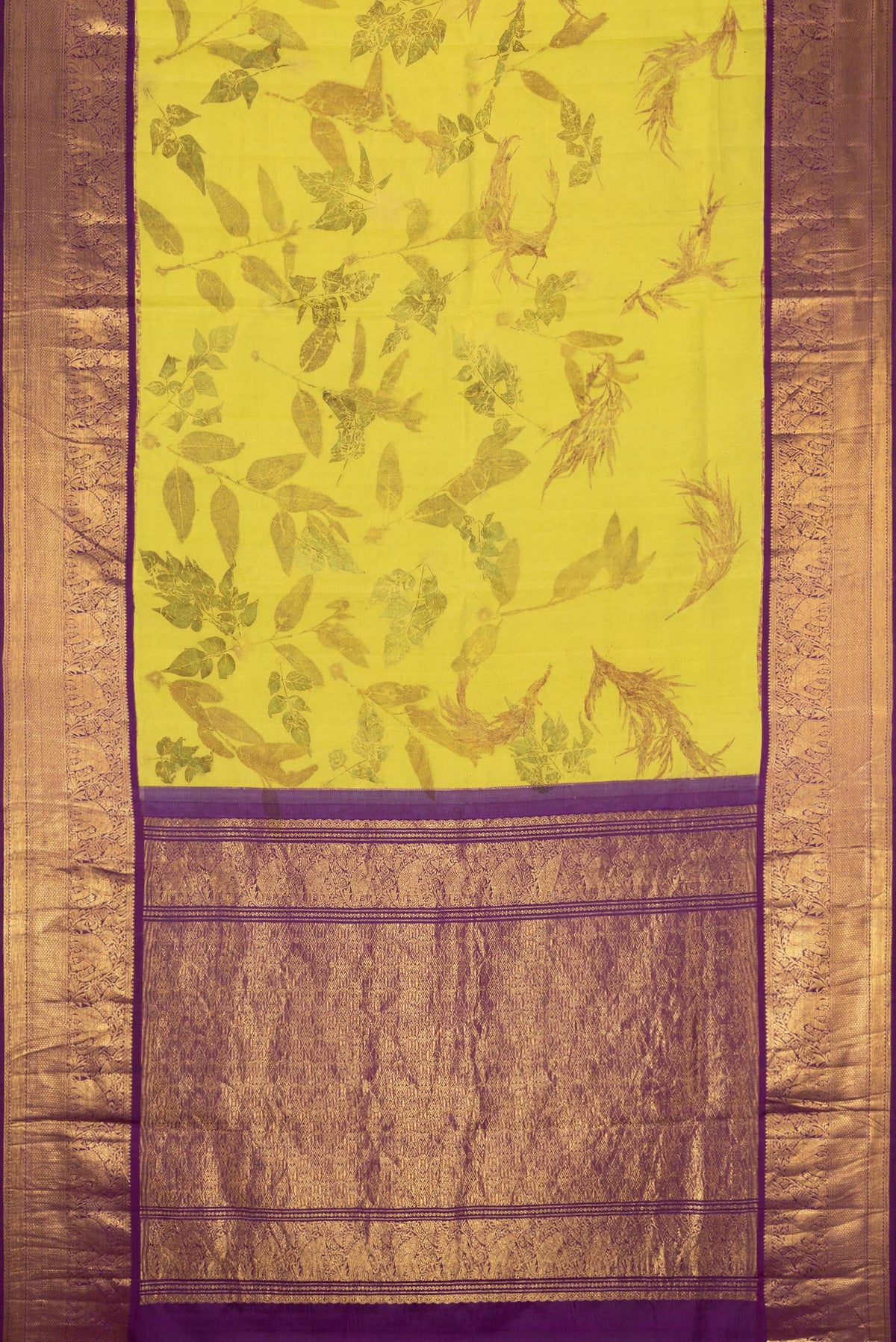 Flat view of Parrot Green Dual Tone Kanchipuram Silk Saree with Printed design on the body and Zari Border. 