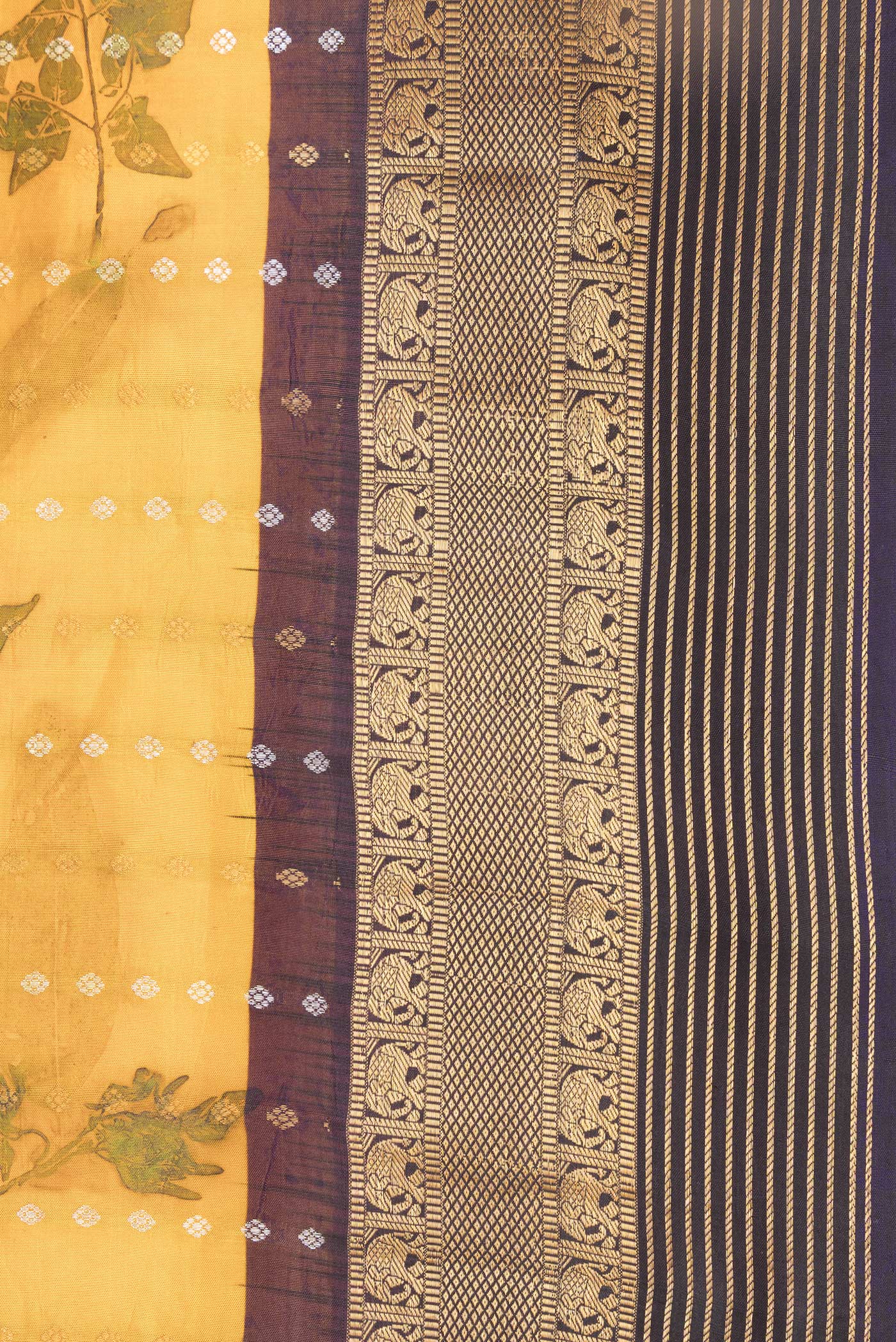 Border image of Mustard Dual Tone Kanchipuram Silk Saree with Printed design on the body and Zari Border. 