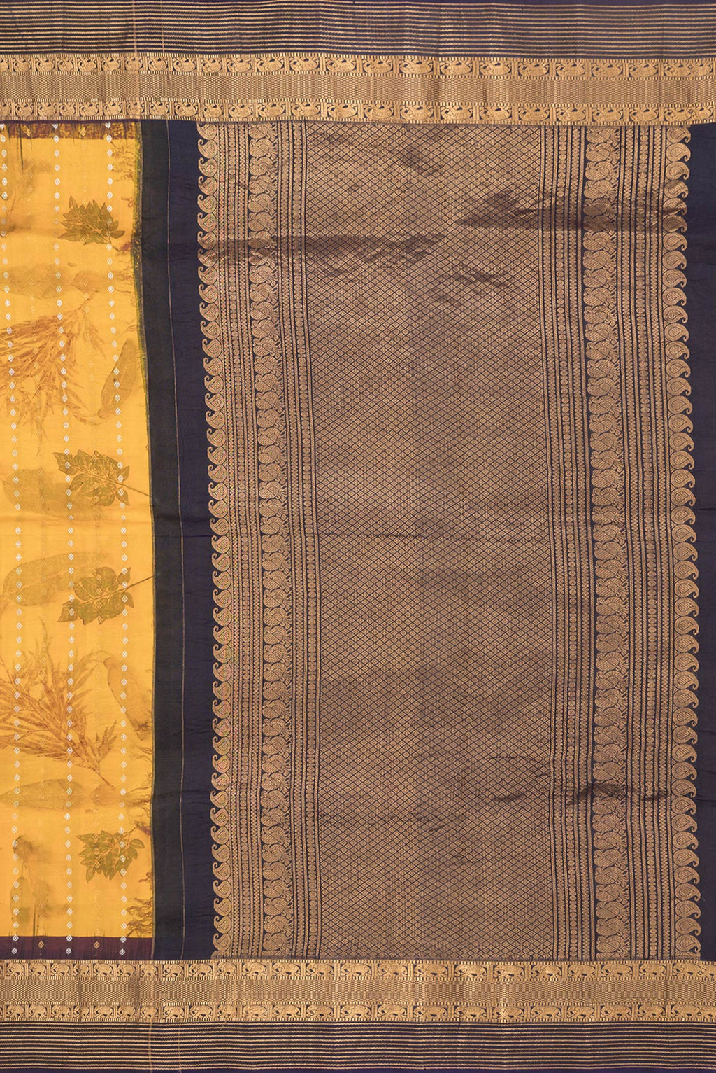 Close up image of the pallu of Mustard Dual Tone Kanchipuram Silk Saree with Printed design on the body and Zari Border. 