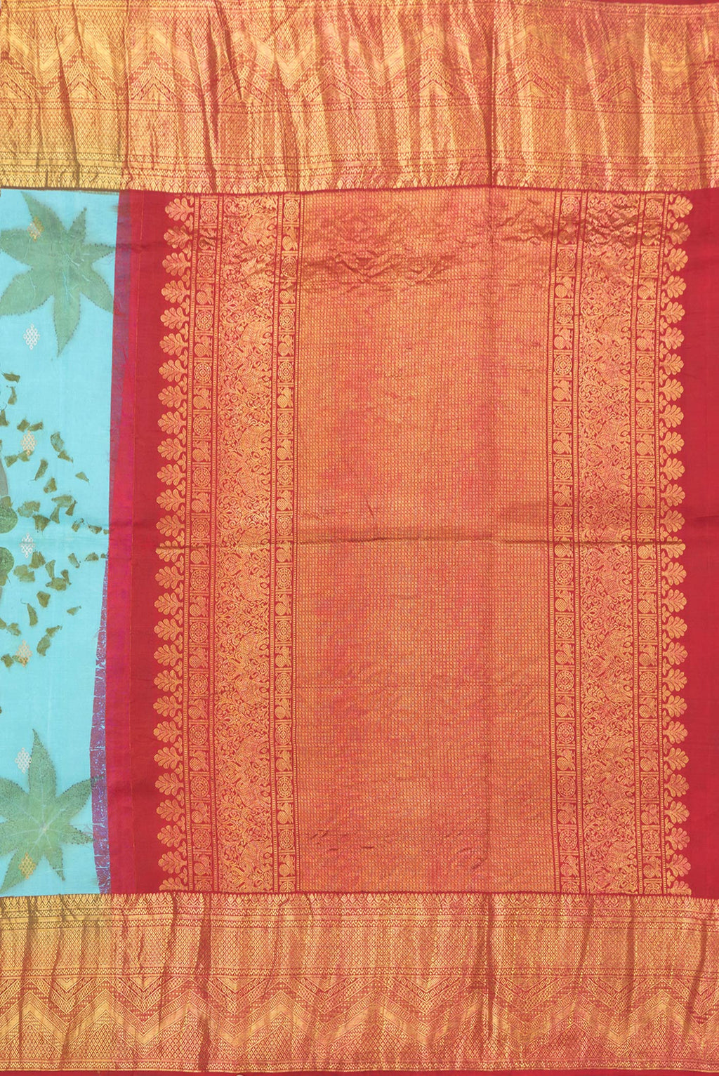 Close up image of the pallu of Sky Blue Dual Tone Kanchipuram Silk Saree with Printed design on the body and Zari Border. 