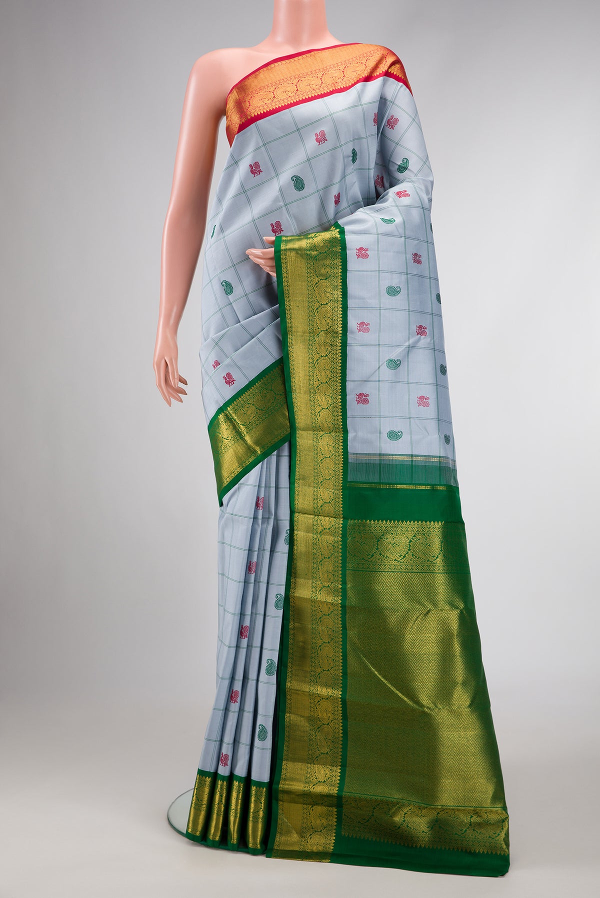 Pure Silk Pure Zari Grey Dual Tone Kanchipuram Saree with Thread Butta on the body and Ganga Jamuna Border.  displayed on a mannequin