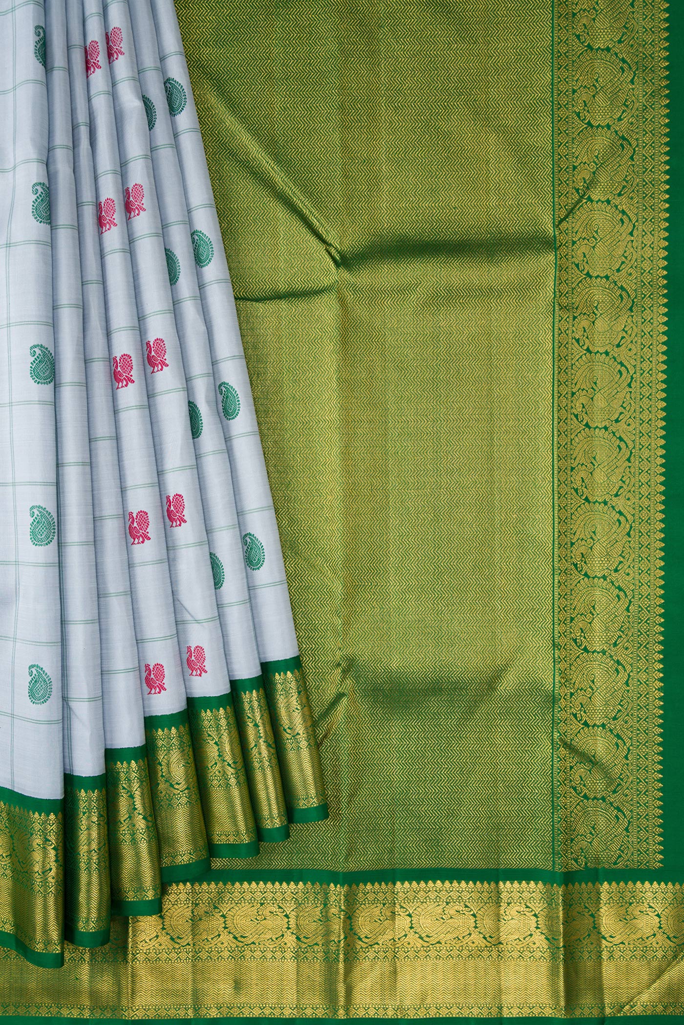 Pleats and pallu of Pure Silk Pure Zari Grey Dual Tone Kanchipuram Saree with Thread Butta on the body and Ganga Jamuna Border. 