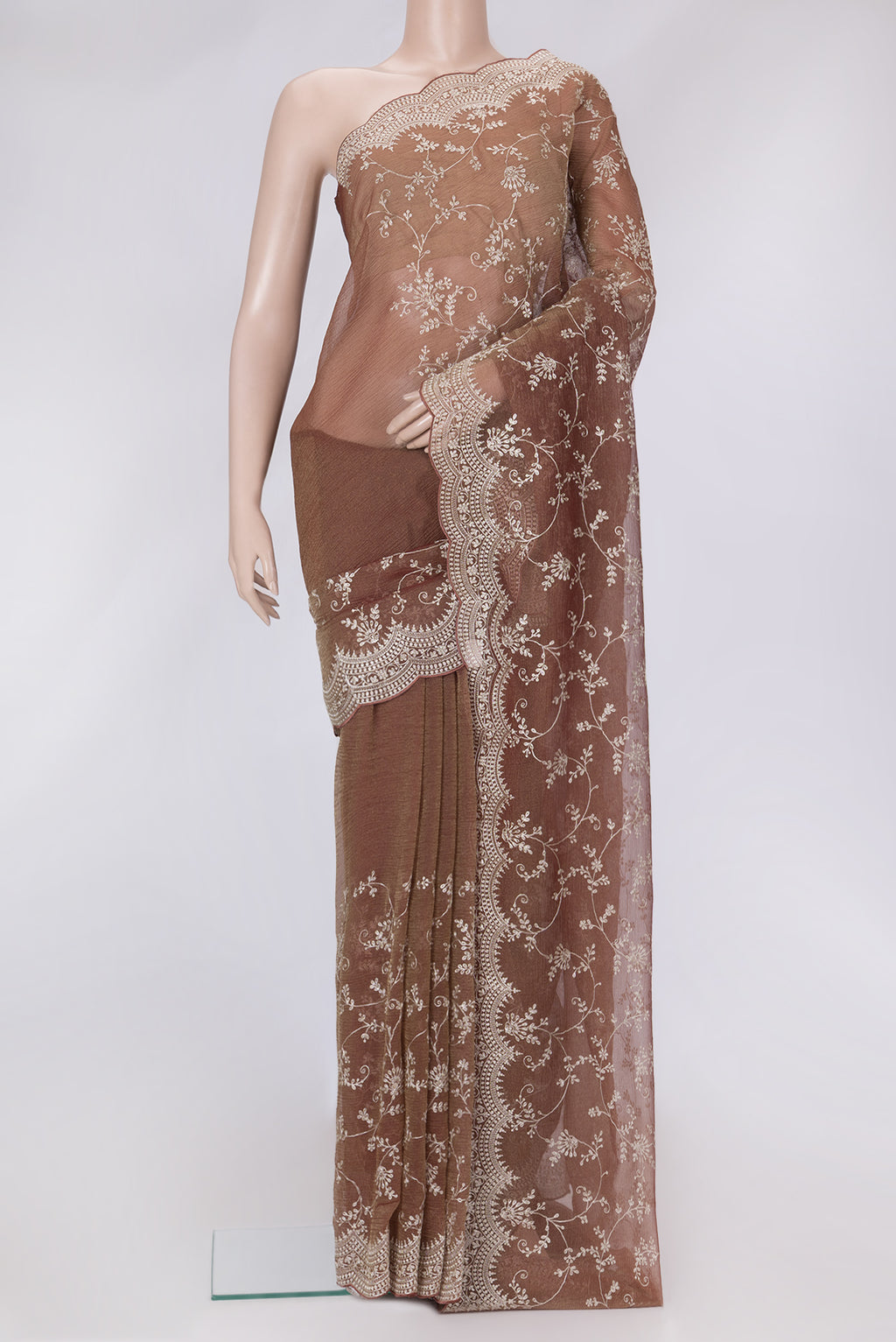 Brown Dual Tone Organza Silk Saree with Embroidery on the body and Embroidery Border.  displayed on a mannequin