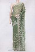 Green Dual Tone Organza Silk Saree with Embroidery on the body and Embroidery Border.  displayed on a mannequin