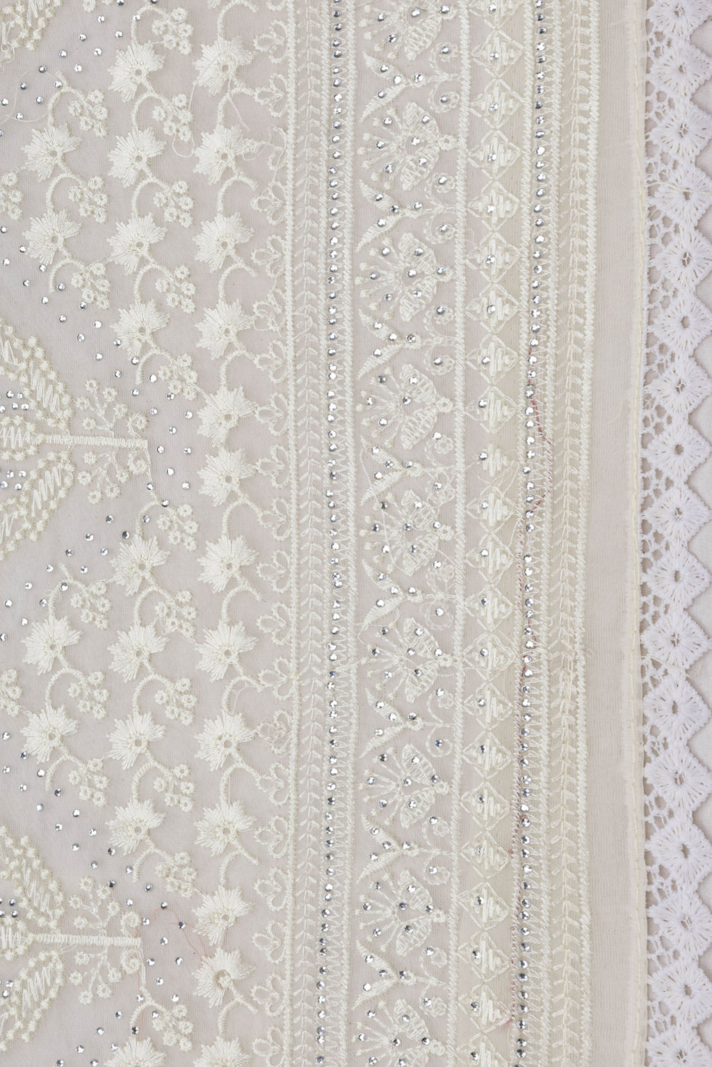 Border image of Sandal Dual Tone Organza Silk Saree with Embroidery on the body and Embroidery Border. 