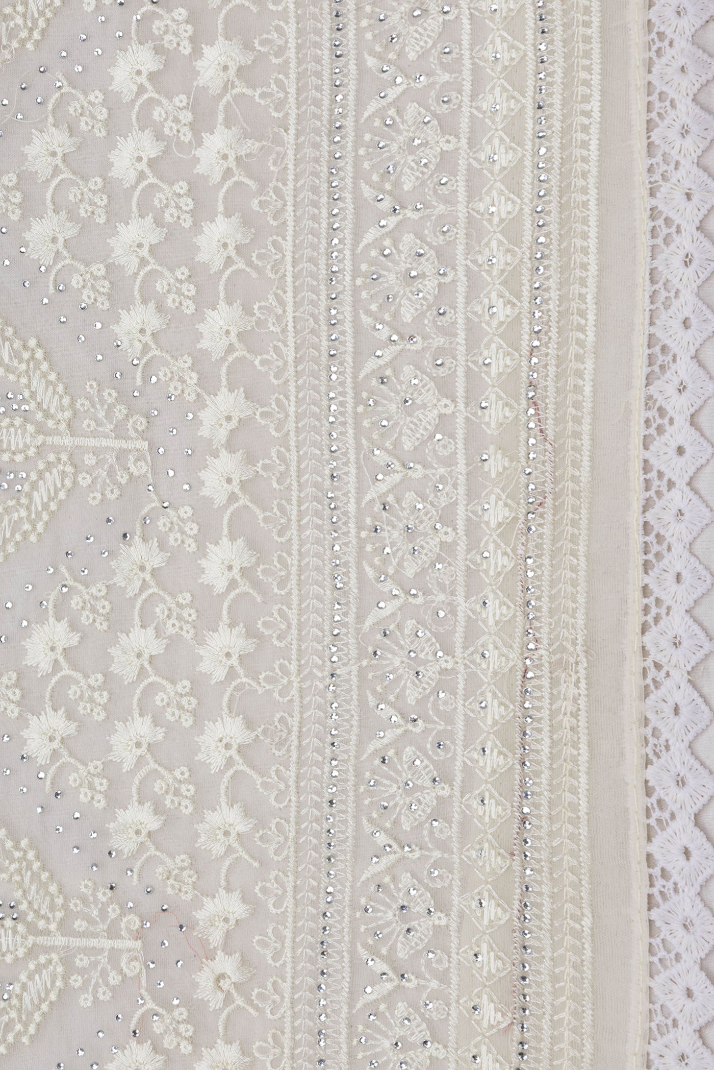 Border image of Sandal Dual Tone Organza Silk Saree with Embroidery on the body and Embroidery Border. 