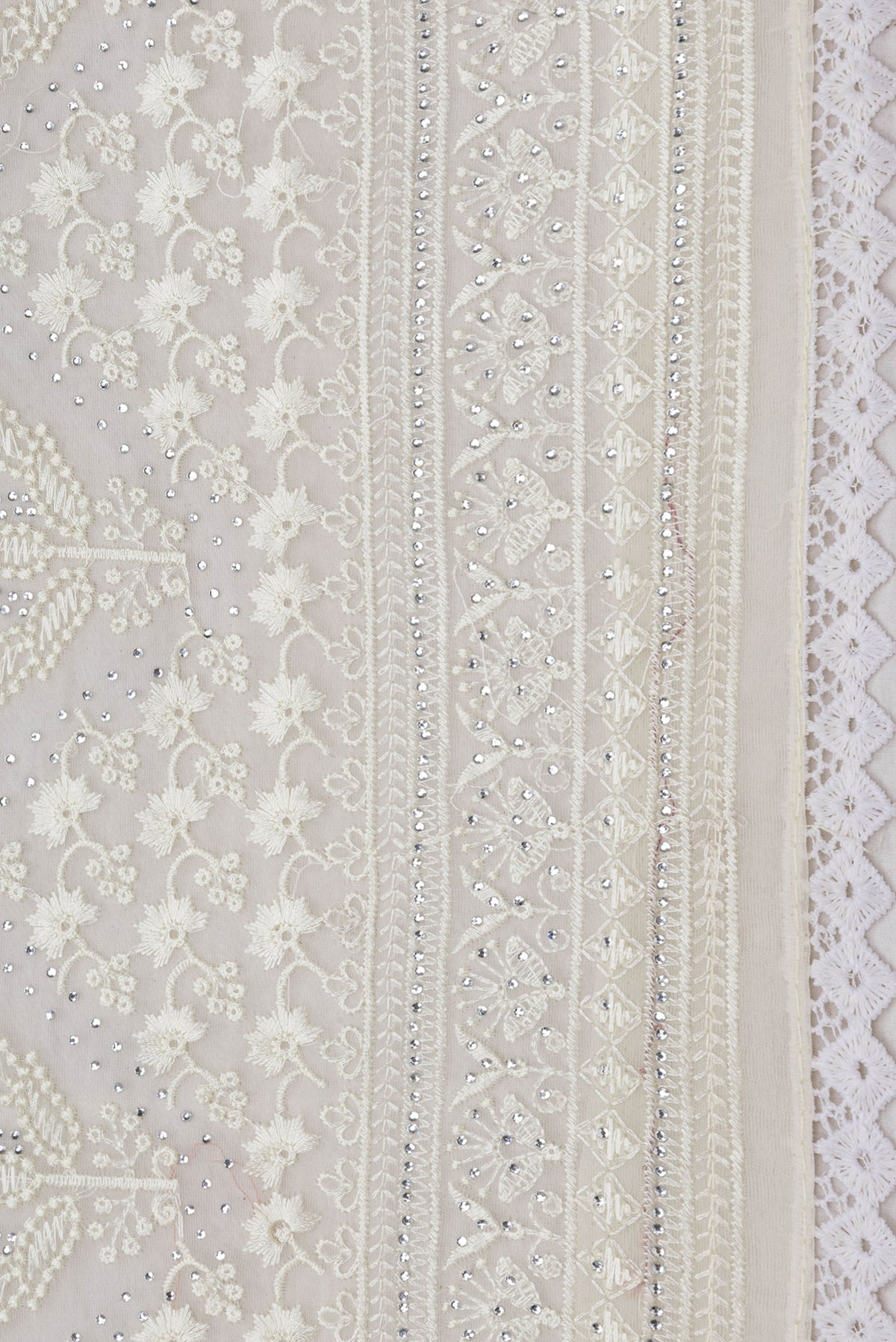 Border image of Sandal Dual Tone Organza Silk Saree with Embroidery on the body and Embroidery Border. 