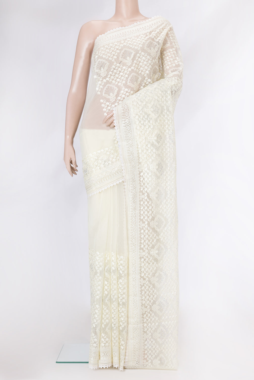 Sandal Dual Tone Organza Silk Saree with Embroidery on the body and Embroidery Border.  displayed on a mannequin