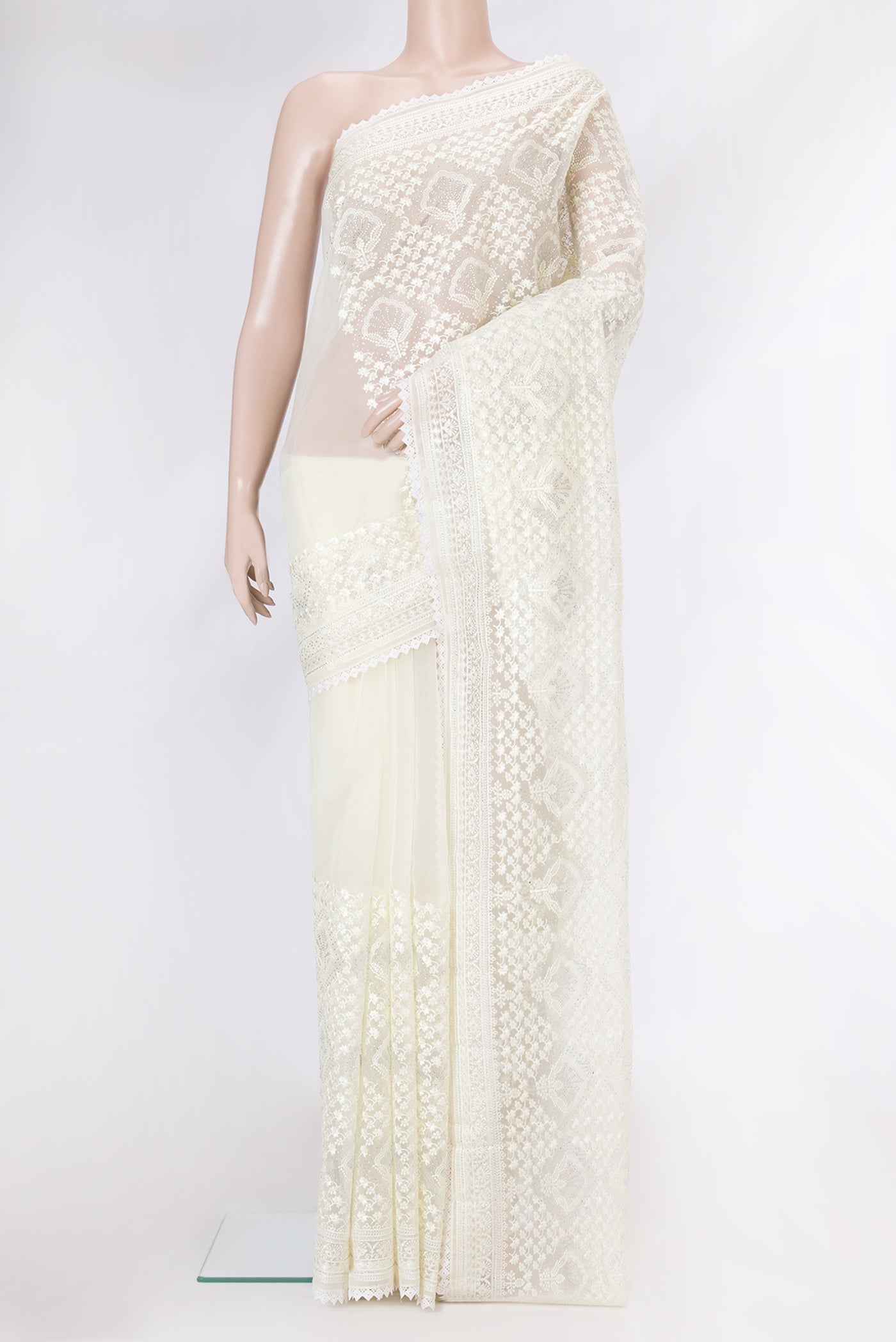 Sandal Dual Tone Organza Silk Saree with Embroidery on the body and Embroidery Border.  displayed on a mannequin