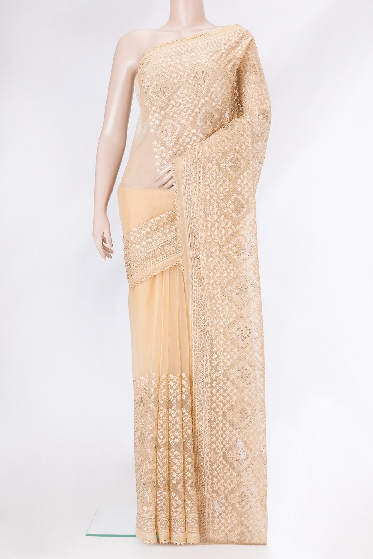 Sandal Dual Tone Organza Silk Saree with Embroidery on the body and Embroidery Border.  displayed on a mannequin