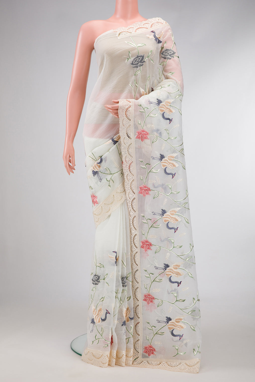 Off White Dual Tone Organza Silk Saree with Embroidery on the body and Embroidery Border.  displayed on a mannequin