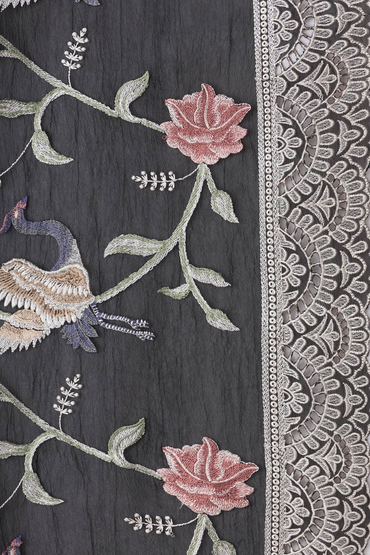 Border image of Black Dual Tone Organza Silk Saree with Embroidery on the body and Embroidery Border. 