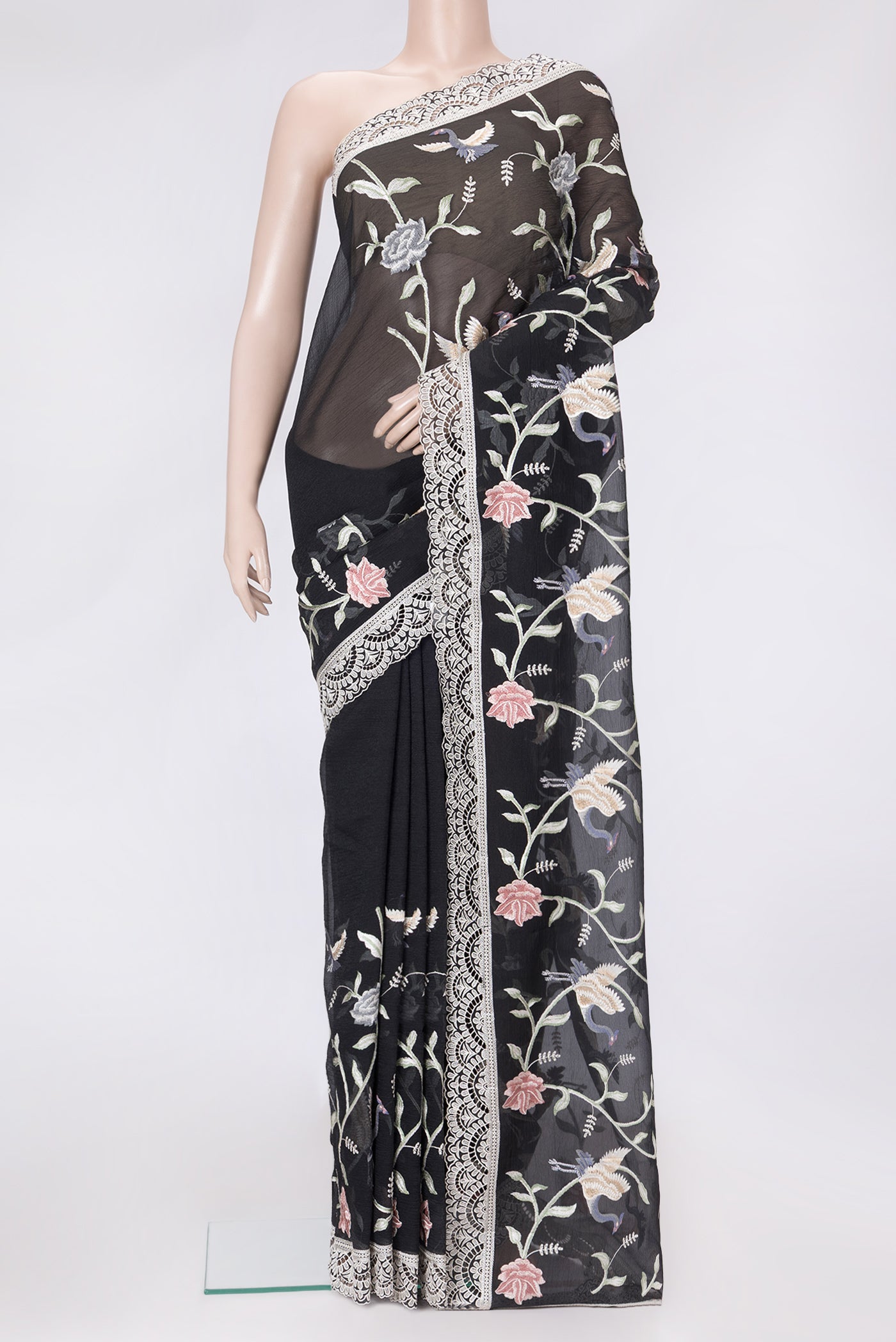 Black Dual Tone Organza Silk Saree with Embroidery on the body and Embroidery Border.  displayed on a mannequin