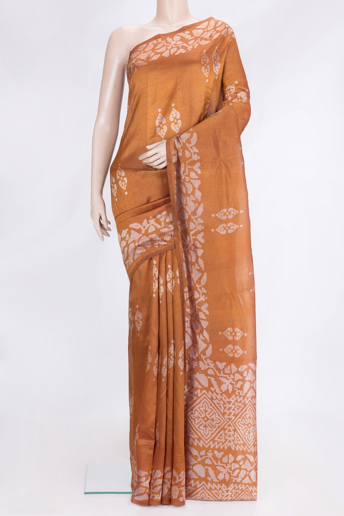 Mustard Dual Tone Tussar Silk Saree with Printed design on the body and Printed Border.  displayed on a mannequin