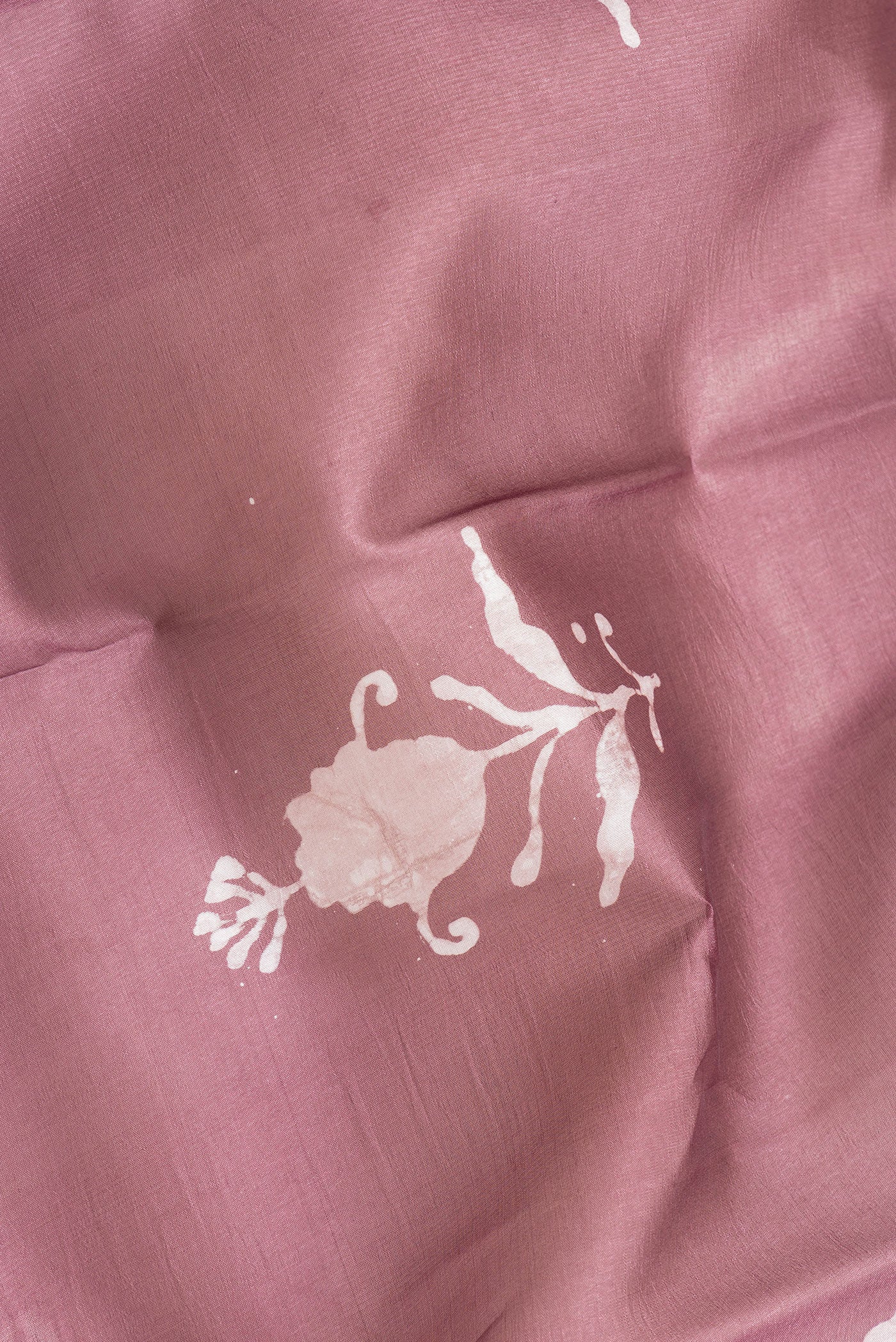 Close up of Purple Dual Tone Tussar Silk Saree with Printed design on the body and Printed Border.  displaying folds