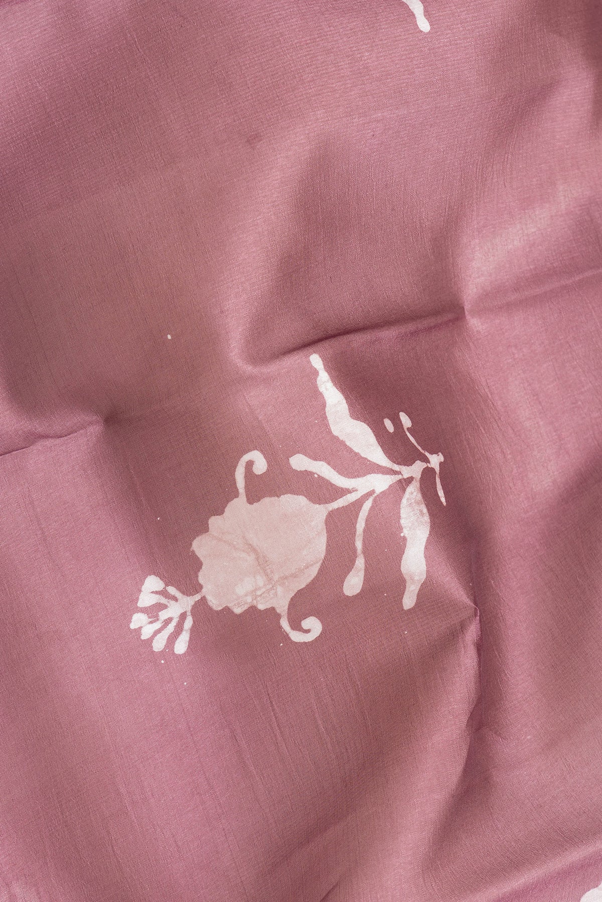 Close up of Purple Dual Tone Tussar Silk Saree with Printed design on the body and Printed Border.  displaying folds