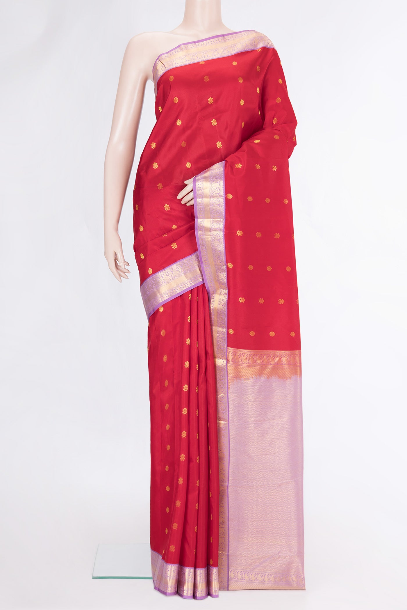 Maroon Dual Tone Kanchipuram Silk Saree with Zari Butta on the body and Zari Border.  displayed on a mannequin