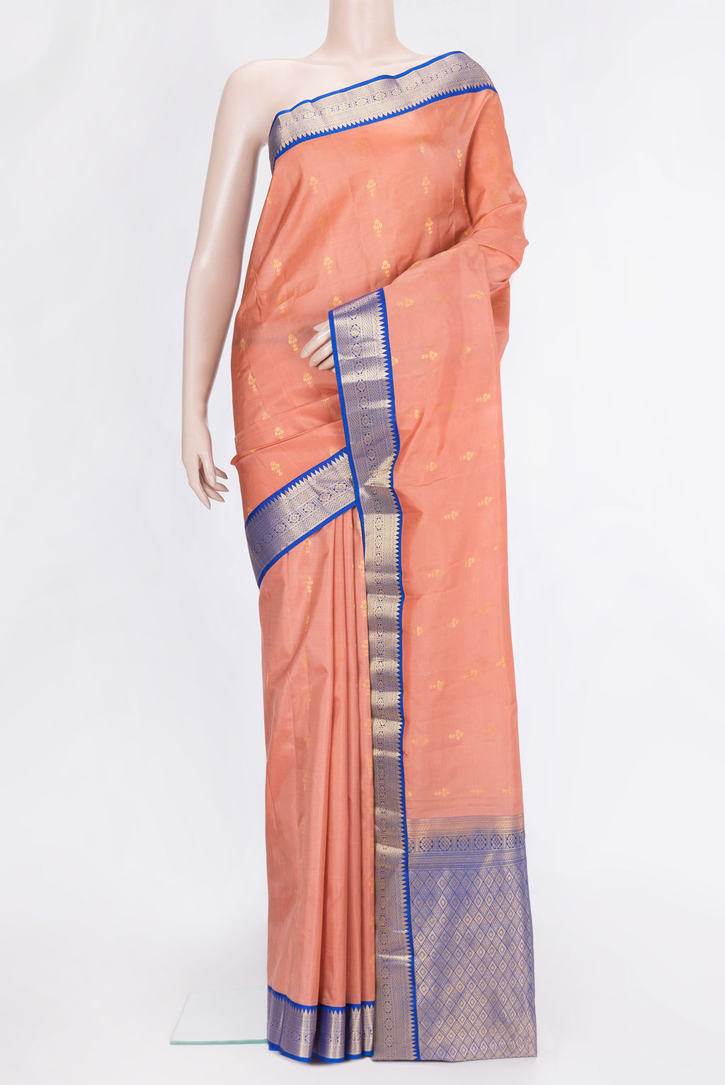 Rose Gold Dual Tone Kanchipuram Silk Saree with Zari Butta on the body and Zari Border.  displayed on a mannequin
