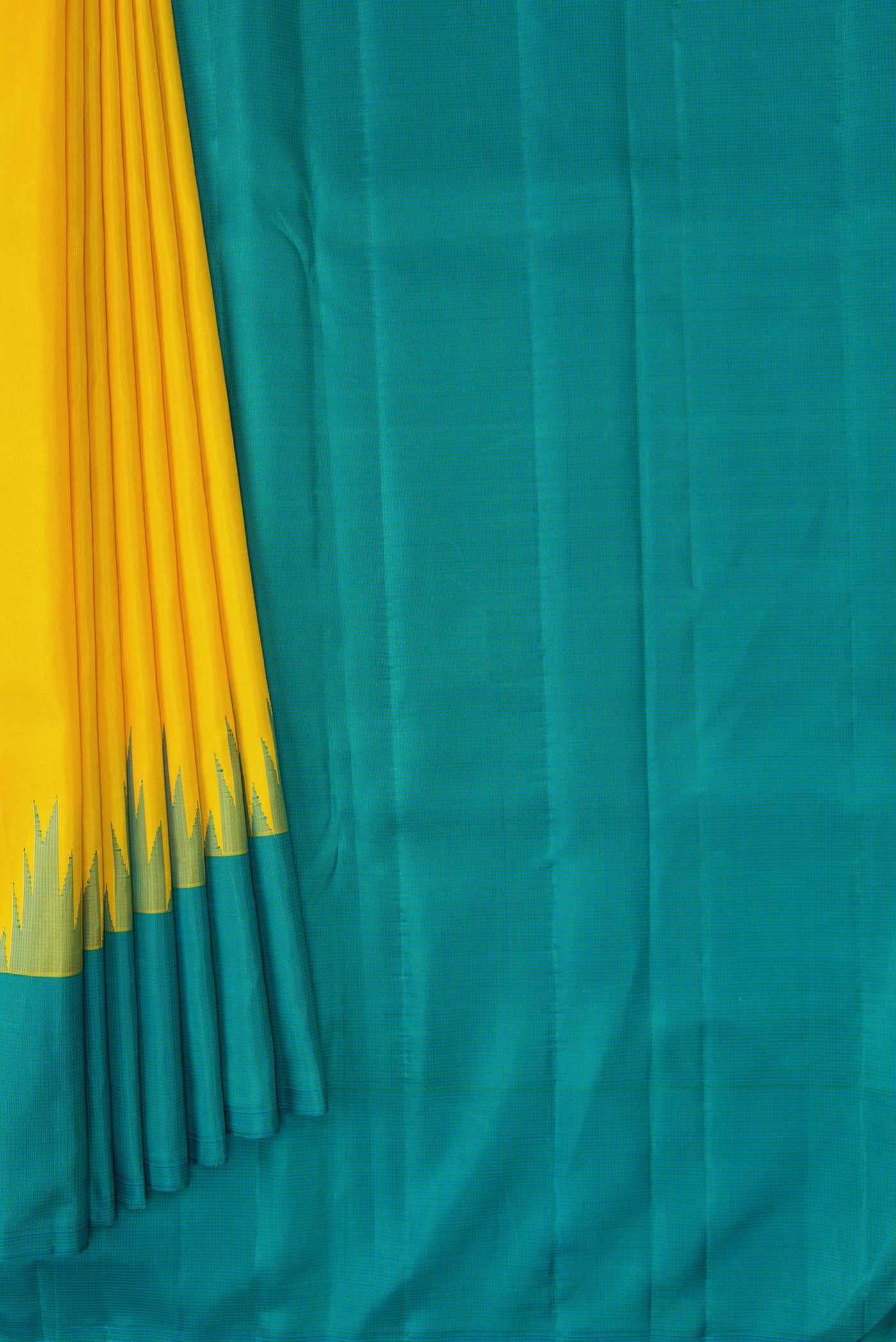 Pleats and pallu of Yellow Dual Tone Kanjivaram Silk Saree with Plain Body and Temple Border. 