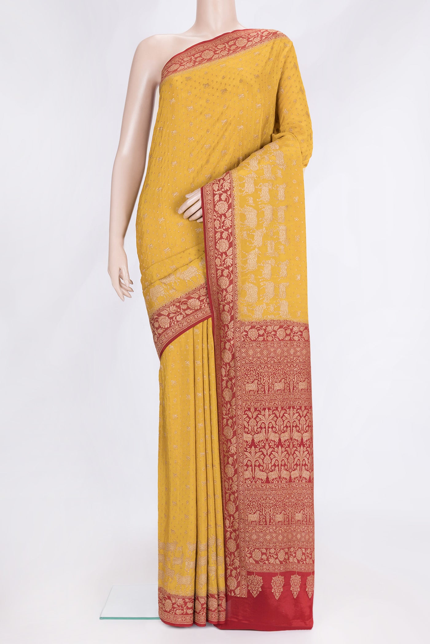 Yellow Dual Tone Banarasi Georgette Saree with Zari Brocade on the body and Zari Border.  displayed on a mannequin