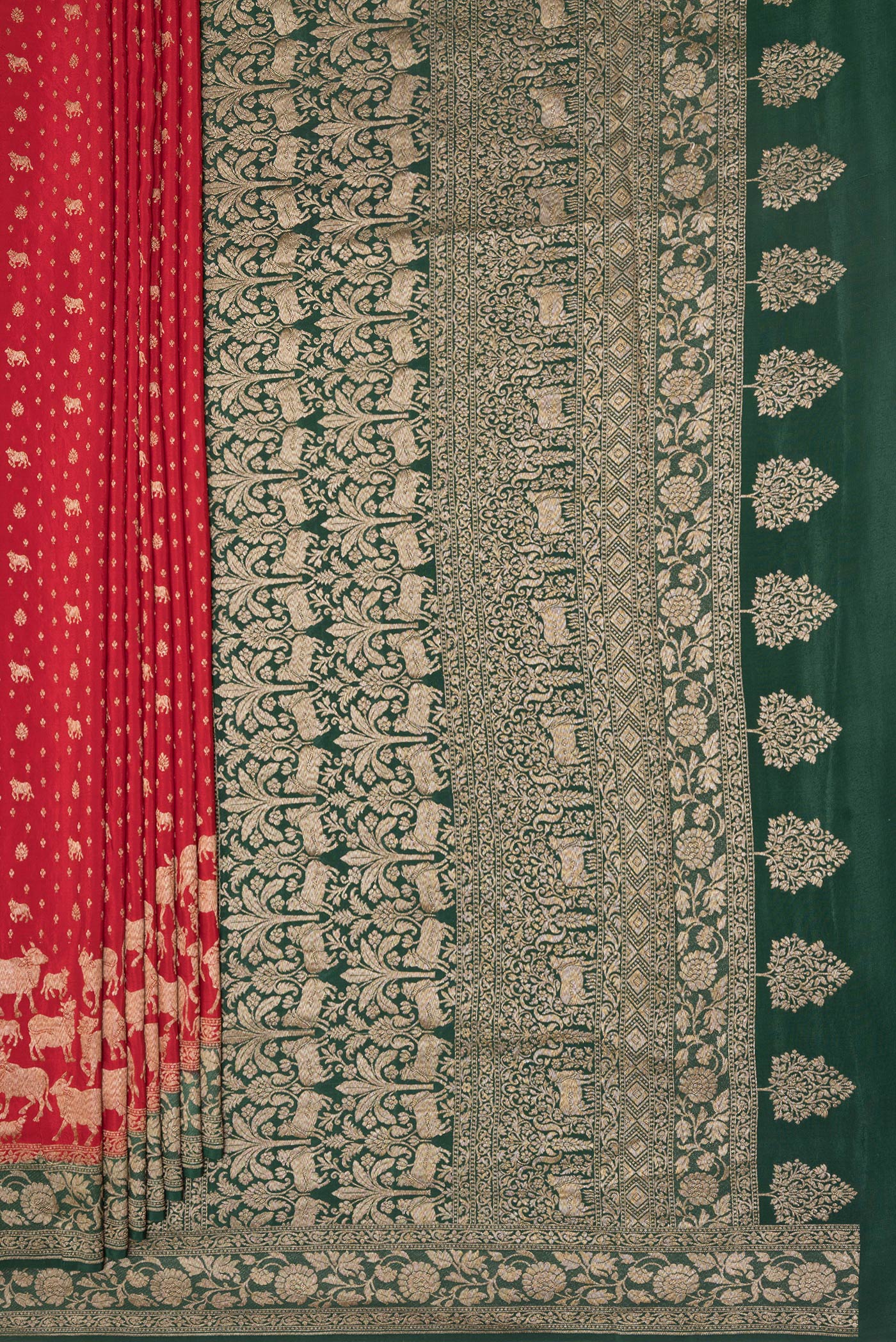 Pleats and pallu of Red Banarasi Georgette Saree with Zari Brocade on the body and Zari Border. 