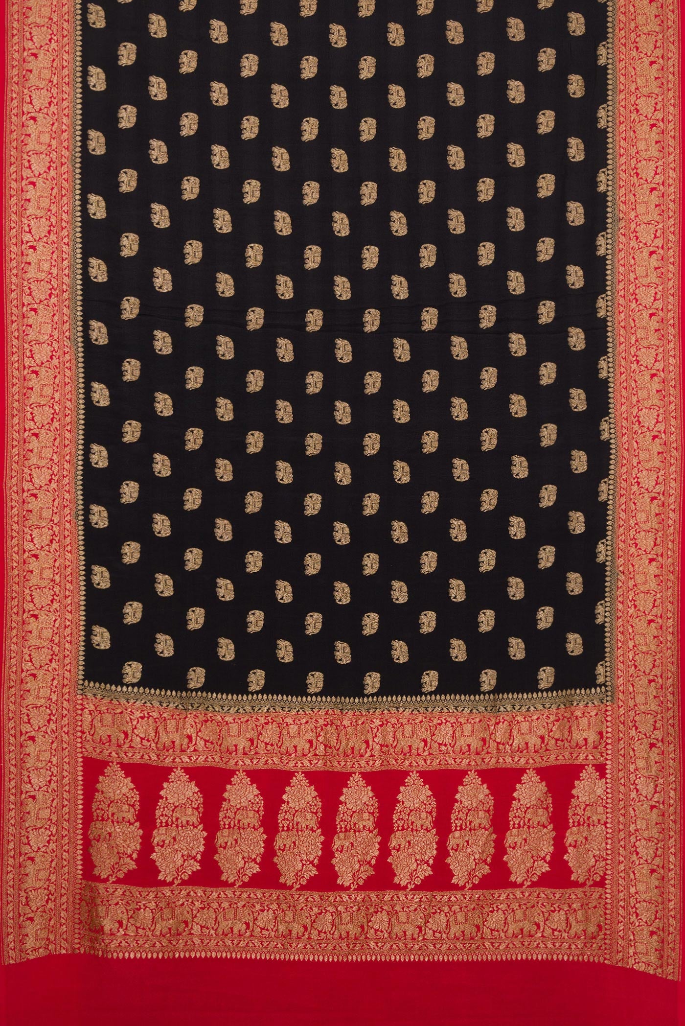 Flat view of Black Dual Tone Georgette Saree with Zari Butta on the body and Zari Border. 