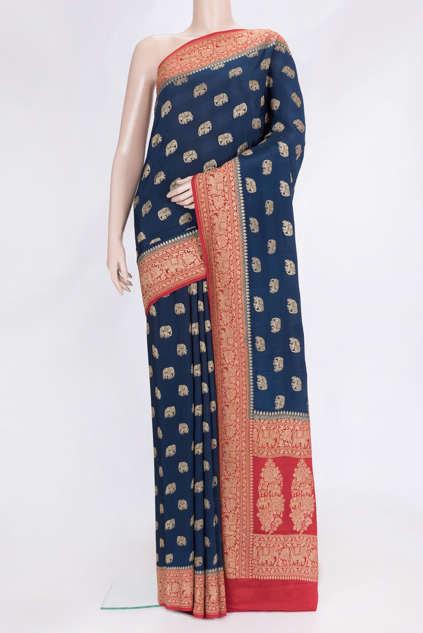 Navy Blue Dual Tone Banarasi Georgette Saree with Zari Butta on the body and Fancy Border.  displayed on a mannequin