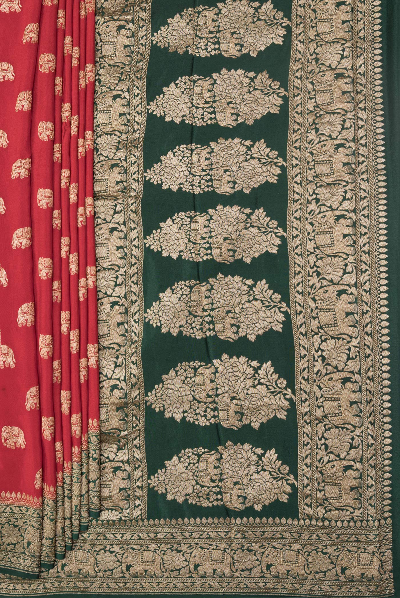 Pleats and pallu of Deep Red Dual Tone Banarasi Georgette Saree with Zari Butta on the body and Zari Border. 