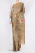 Dark Beige Tussar Silk Saree with Printed design on the body and Zari Border.  displayed on a mannequin
