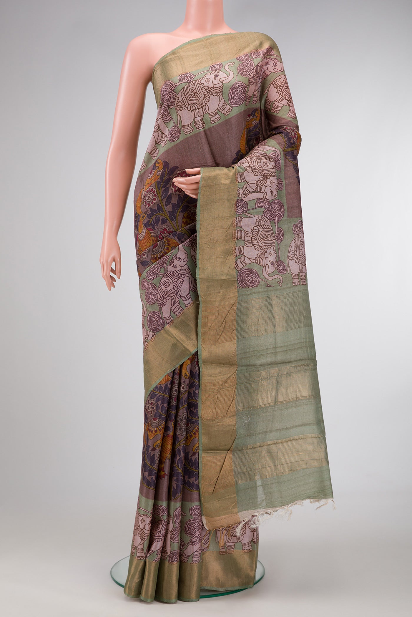 Purple Dual Tone Tussar Silk Saree with Printed design on the body and Zari Border.  displayed on a mannequin