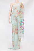 Sky Blue Organza Silk Saree with Floral Print on the body and Thin Zari Line.  displayed on a mannequin