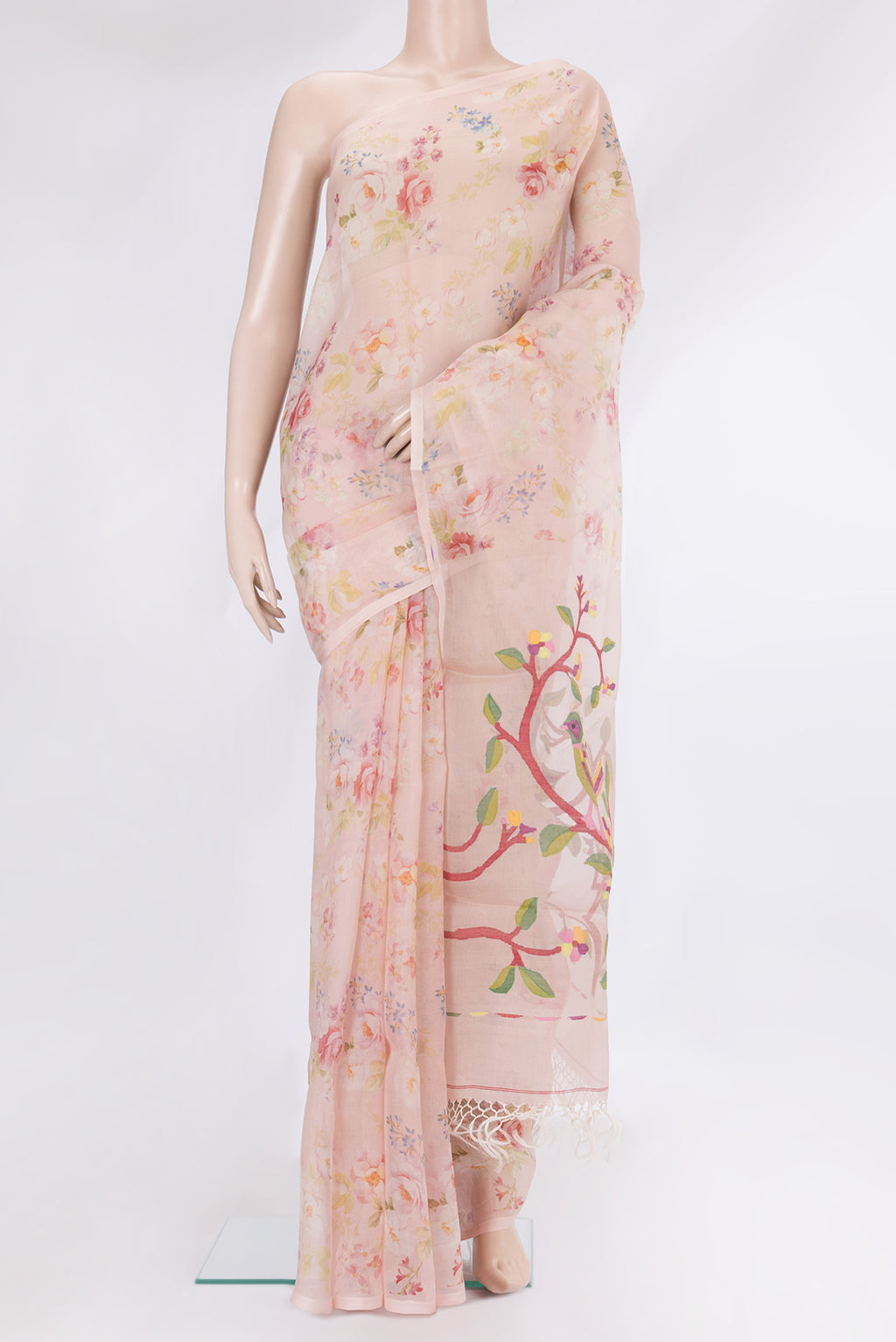 Rose Gold Organza Silk Saree with Floral Print on the body and Without Border.  displayed on a mannequin